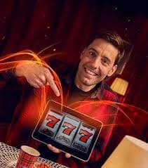 nenektogel4d apk sportsbook and slot games displayed on mobile phone screen